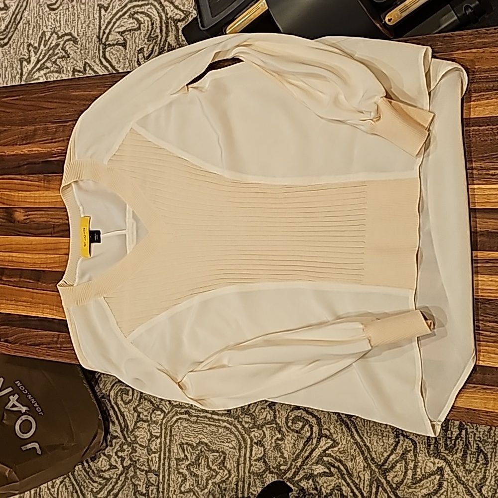 St. John Shirt, size P excellent pre-owned with fixable tear on collar